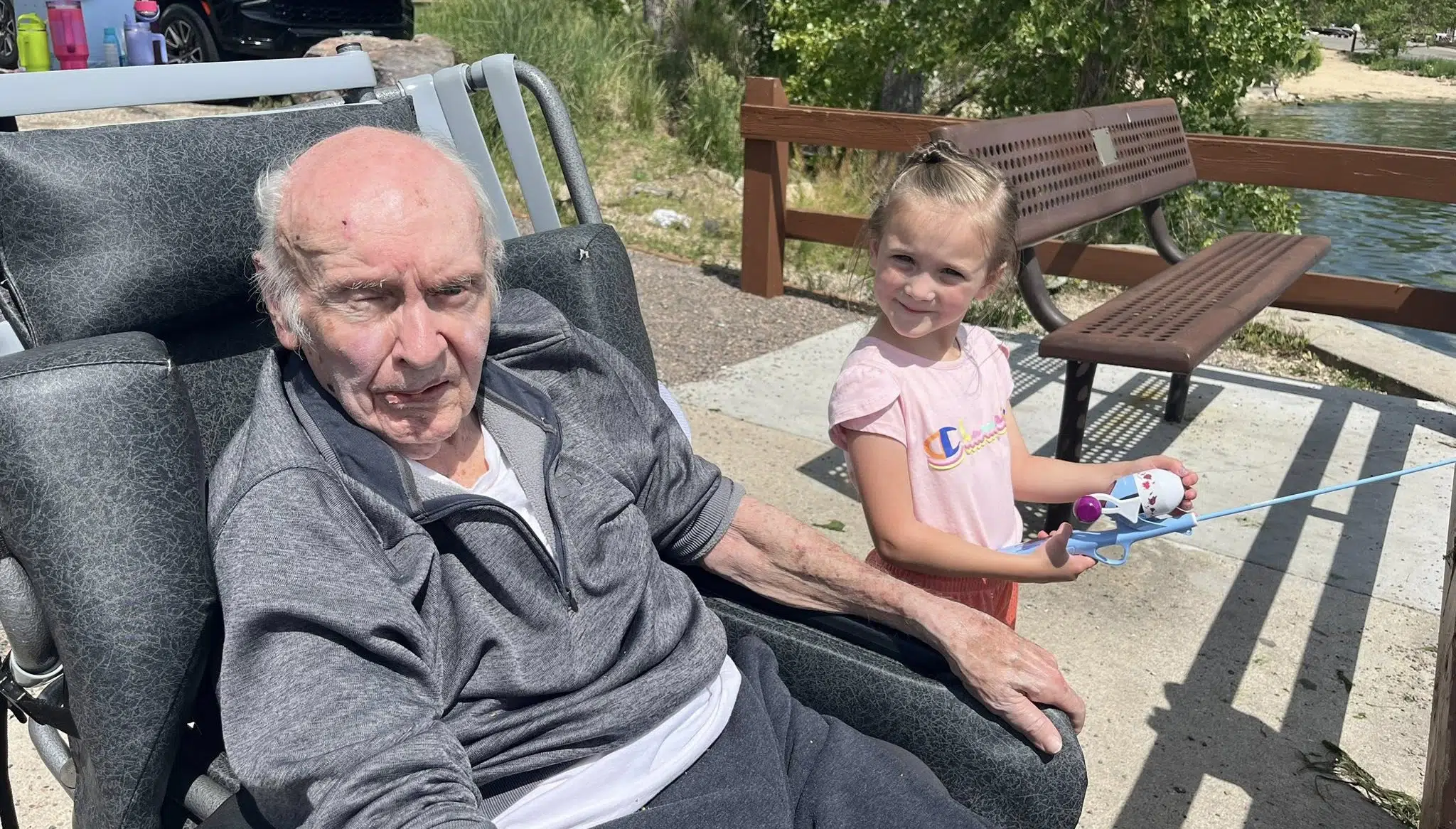 Chelsea Place Resident, Bob Harlan, Shares His Love of Fishing with His Great-Granddaughters