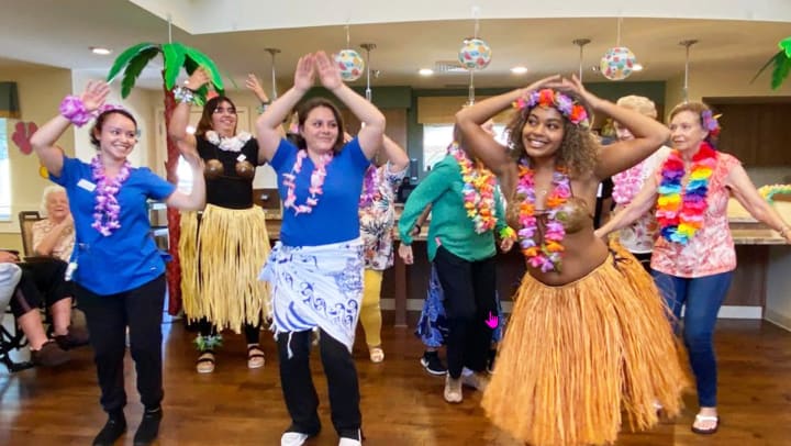 Leis, Dancing, and Hawaiian Food Make Vineyard Place's Luau a Success!