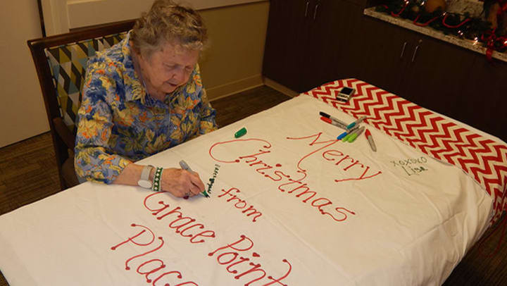 Residents of Grace Point Place Memory Care Fill a Stocking with Love and Hope