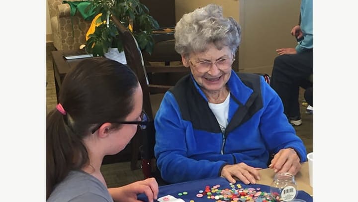 Halloween Crafts Bring Students and Memory Care Residents Together