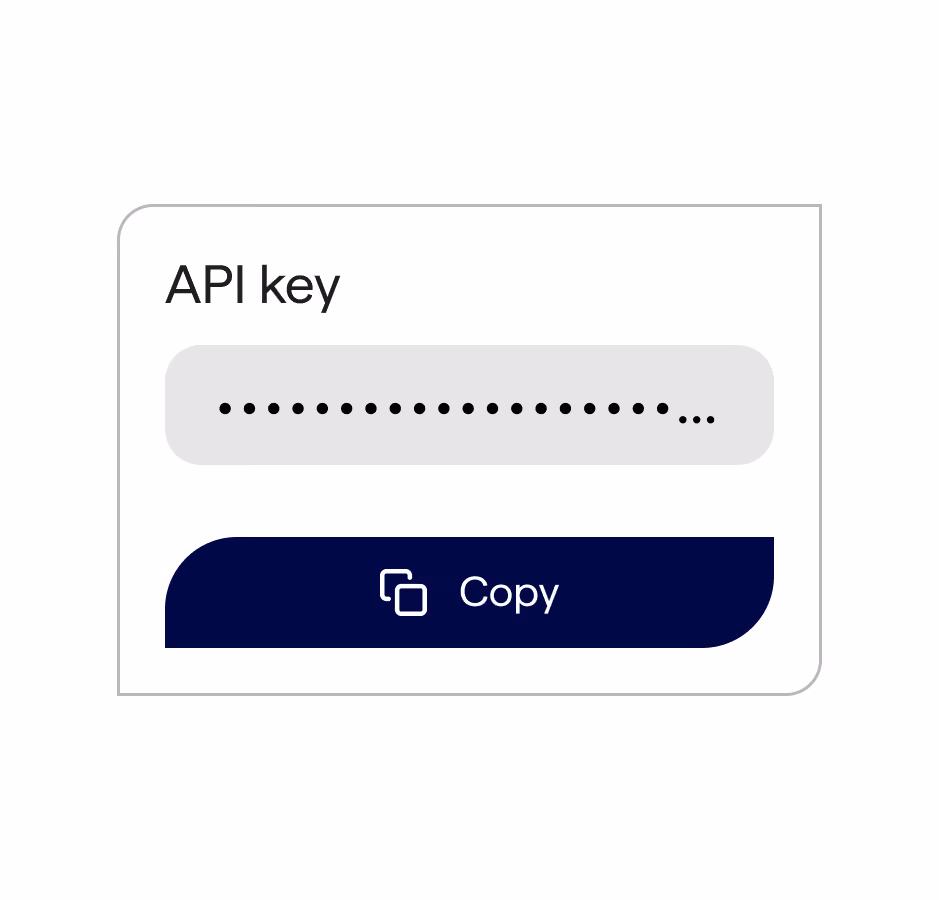 API key input field with hidden characters and a dark blue copy button below.