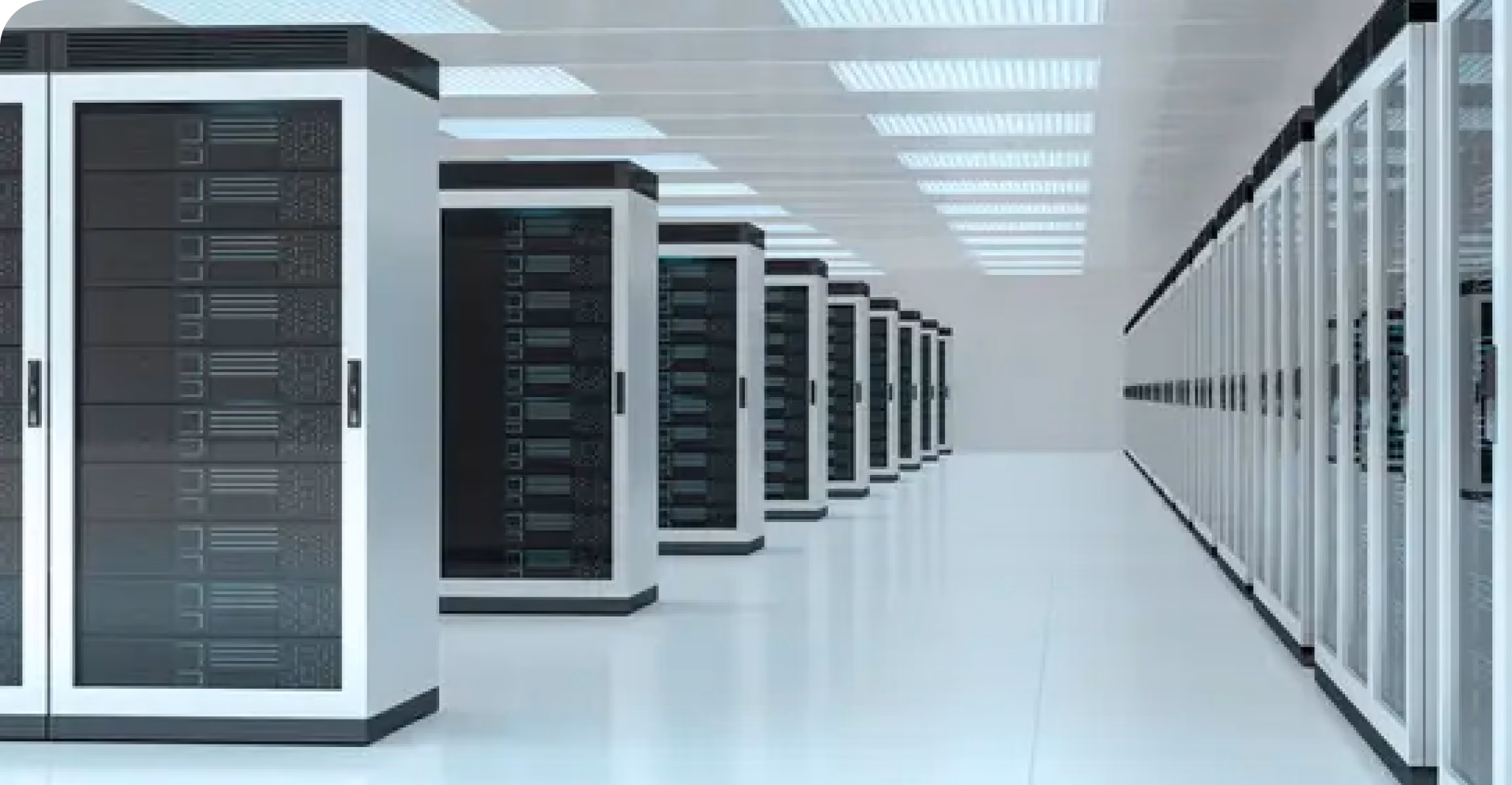 Long row of white server racks with black equipment inside in a bright, modern data center.