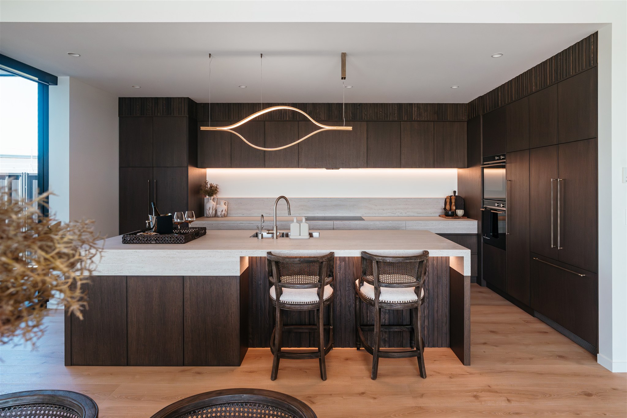 Modern architectural home with outdoor living area built to last by Millar Construction