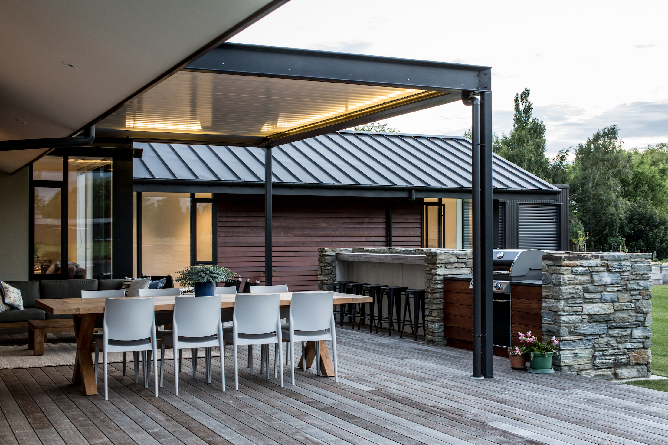 Modern architectural home with outdoor living area built to last by Millar Construction