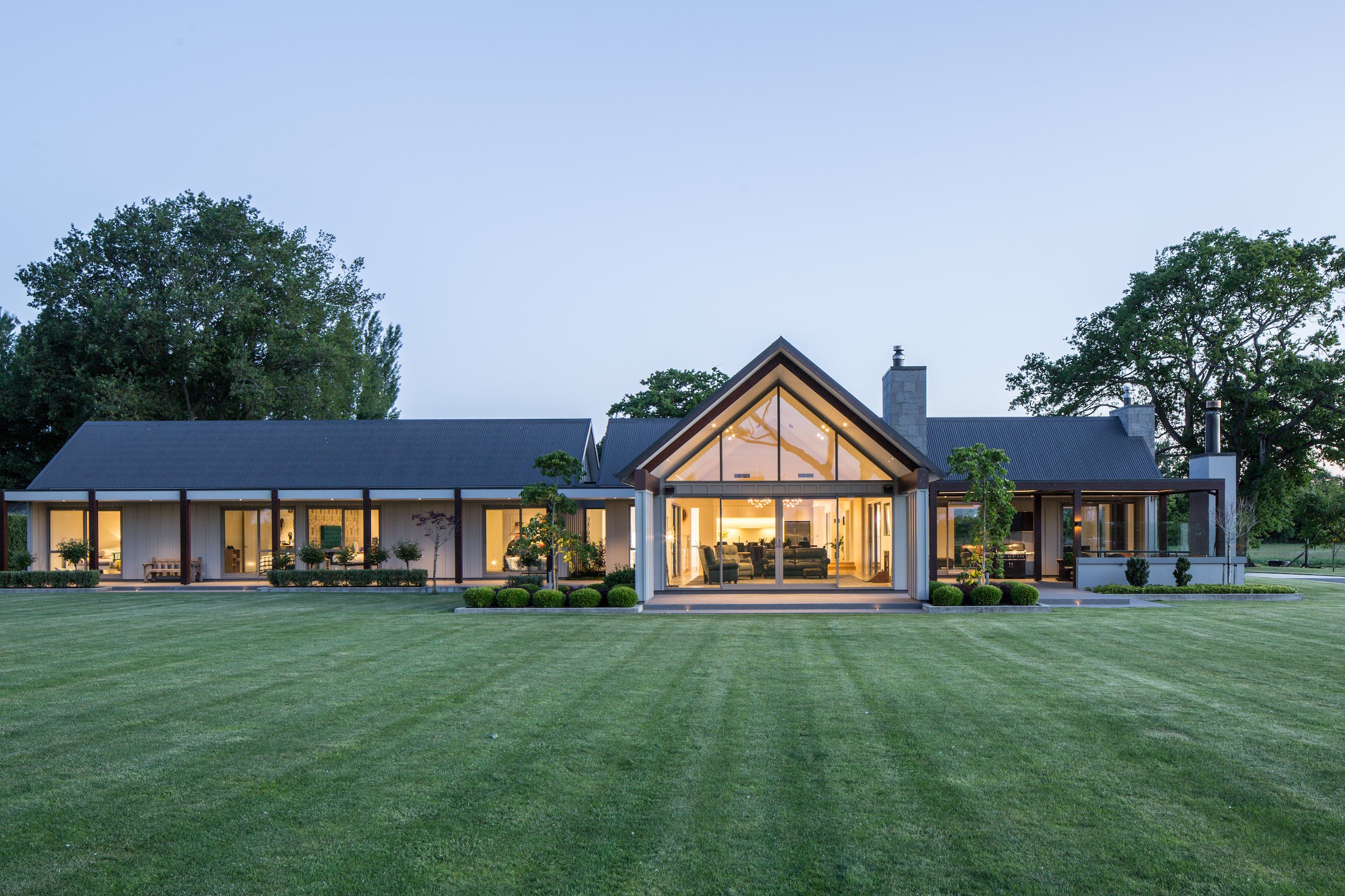 Modern architectural home with outdoor living area built to last by Millar Construction