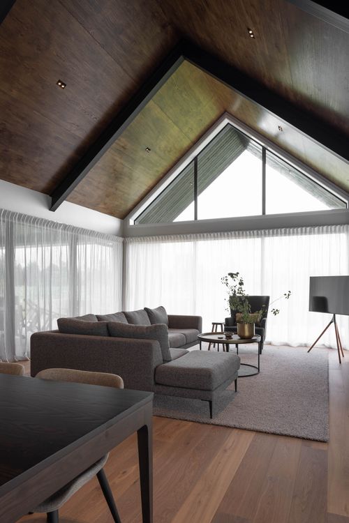 Modern architectural home with outdoor living area built to last by Millar Construction