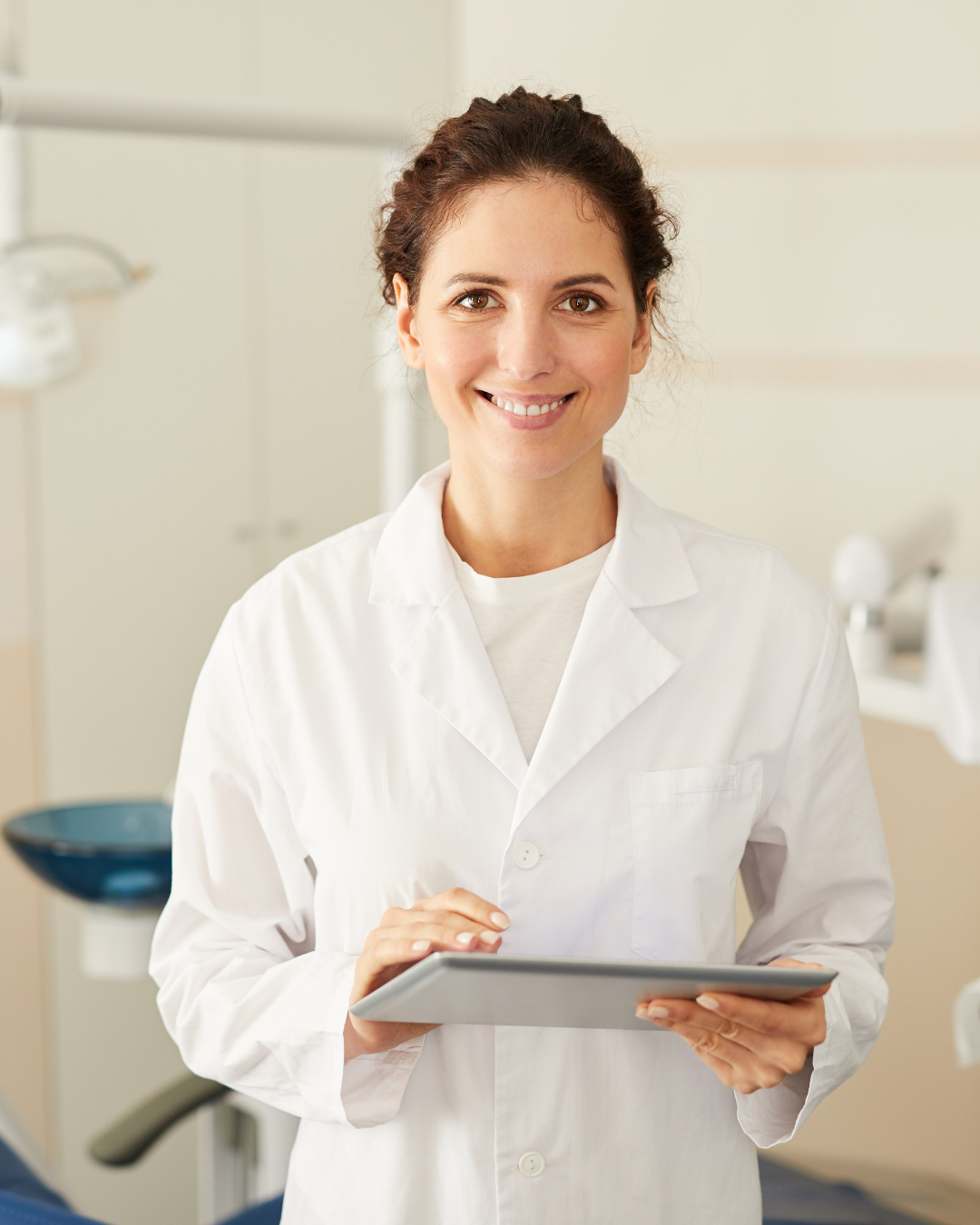 Femal oral health professional with clipboard