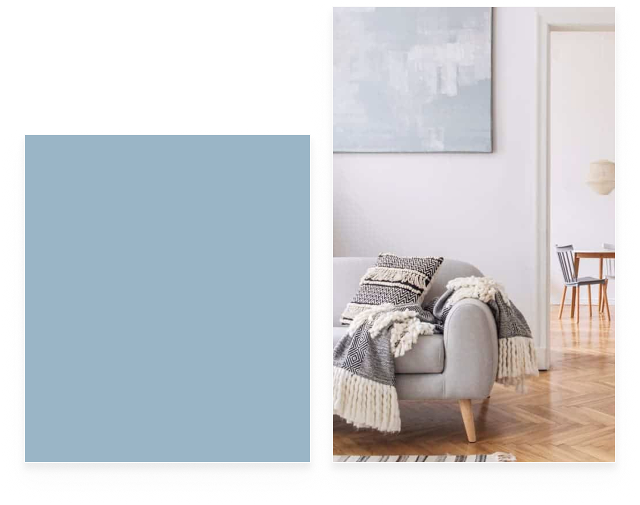 Cozy gray sofa with patterned pillows and fringed throw in a bright living room with wooden floor.