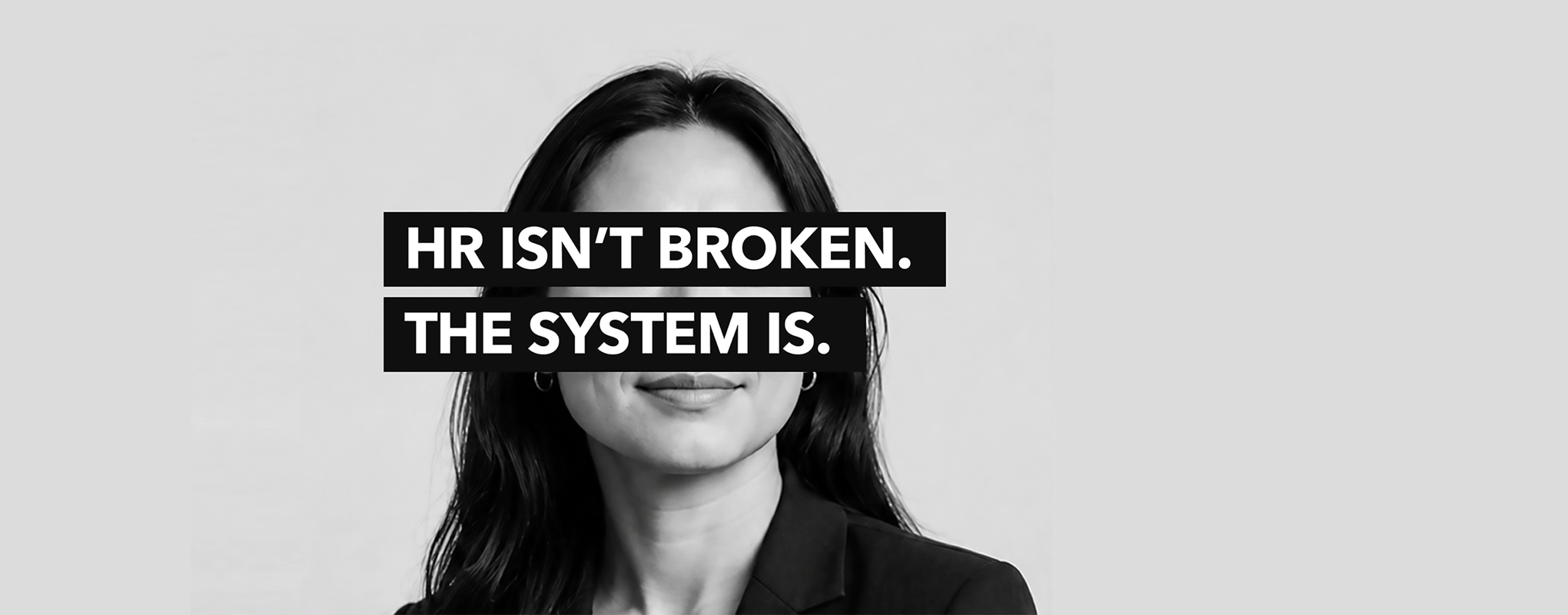 Black and white portrait of a woman with text overlay: HR isn't broken. The system is.