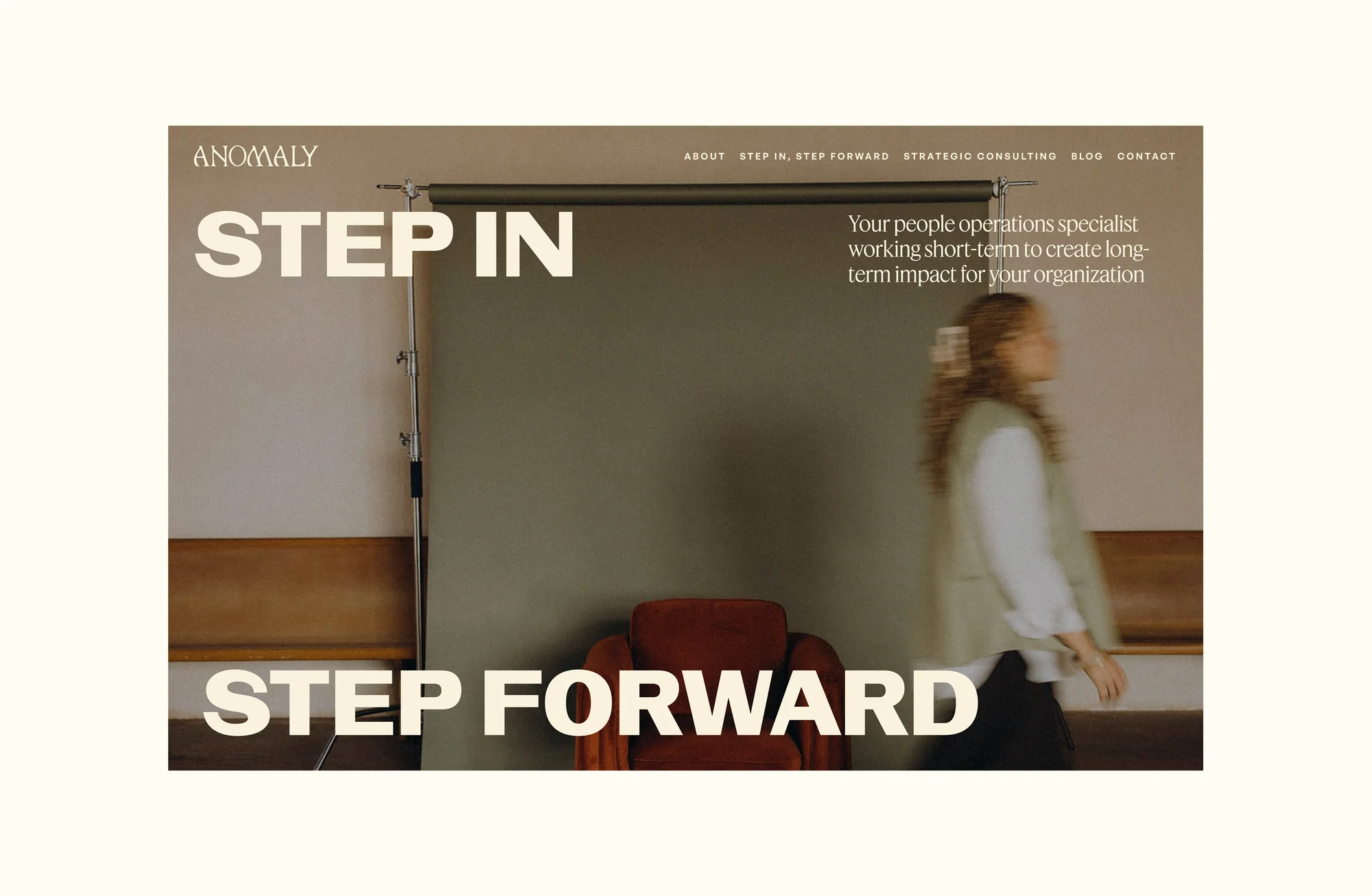 Anomaly Step In Step Forward service page desktop view with blurred motion photo of founder walking and bold headline