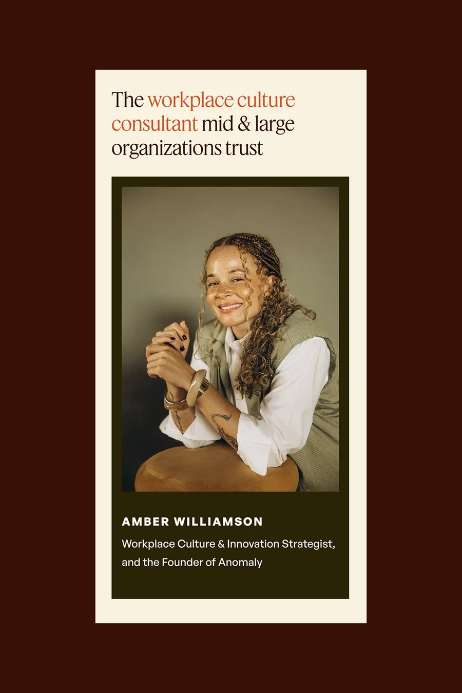 Amber Williamson workplace culture consultant and Anomaly founder profile card with portrait photo on dark burgundy background