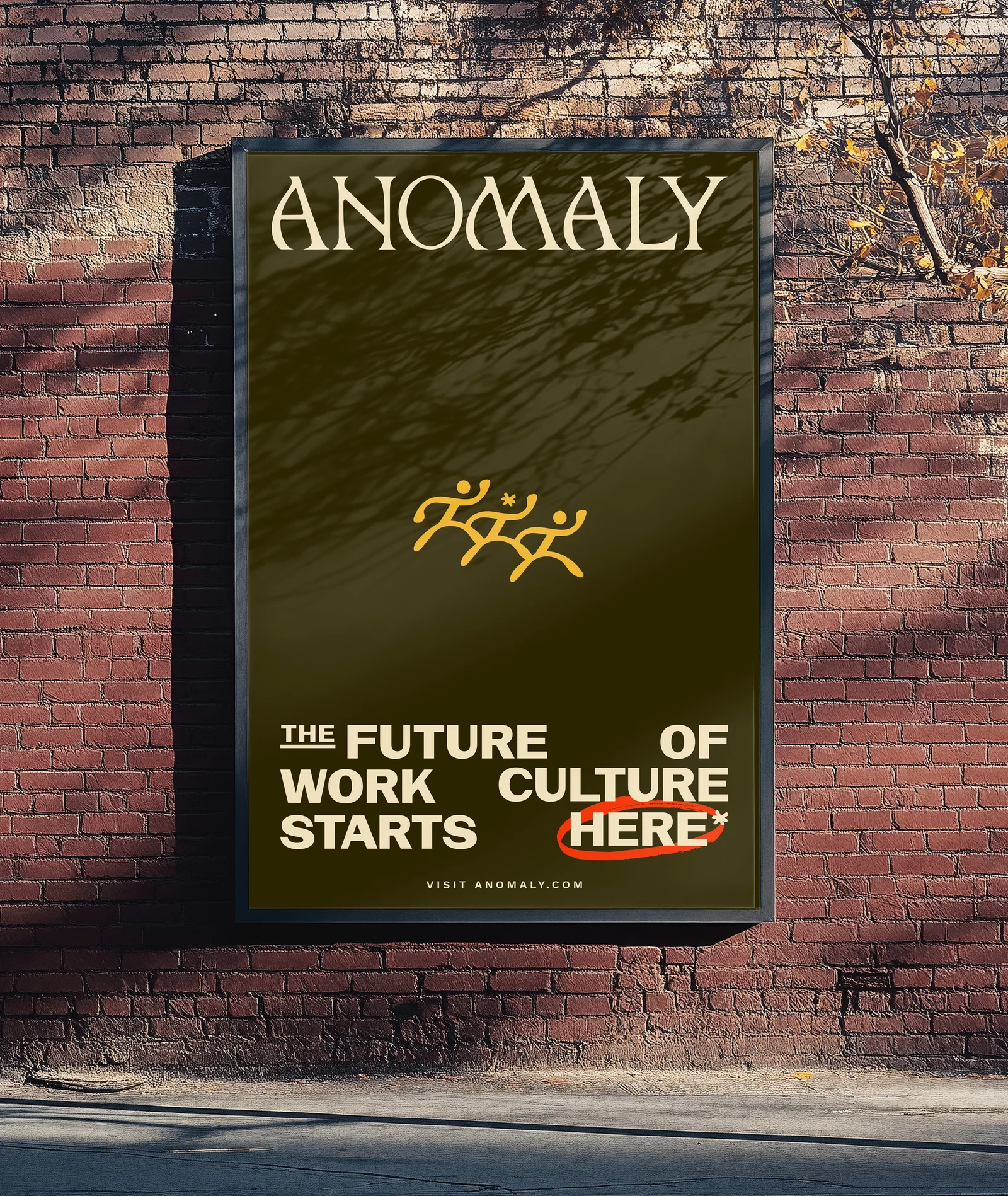 Anomaly brand identity shown on a vertical billboard mockup mounted on a brick wall