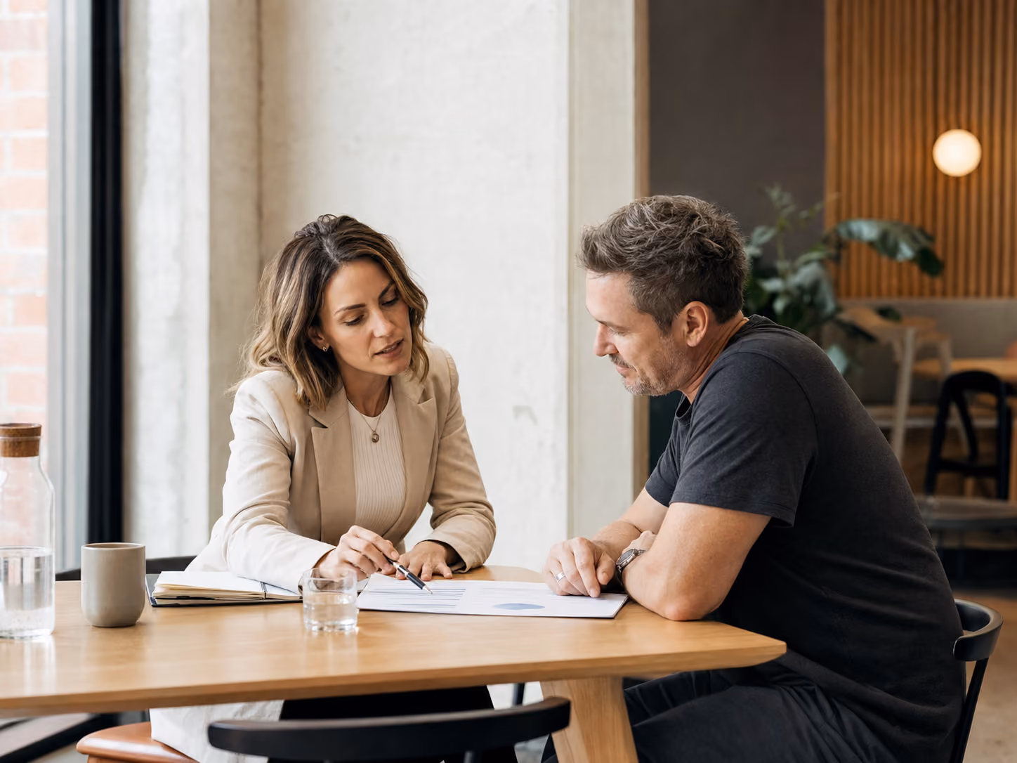 360 group adviser speaking with a client on the phone
