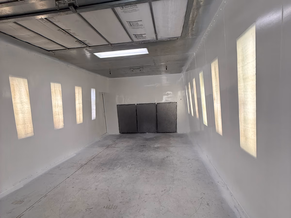 Empty rectangular white room with walls covered with peelable coating.