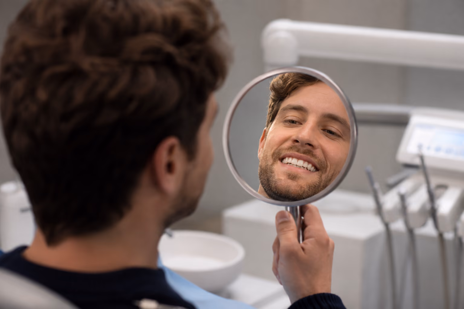 Patient smiling during a dental prototype try-in appointment