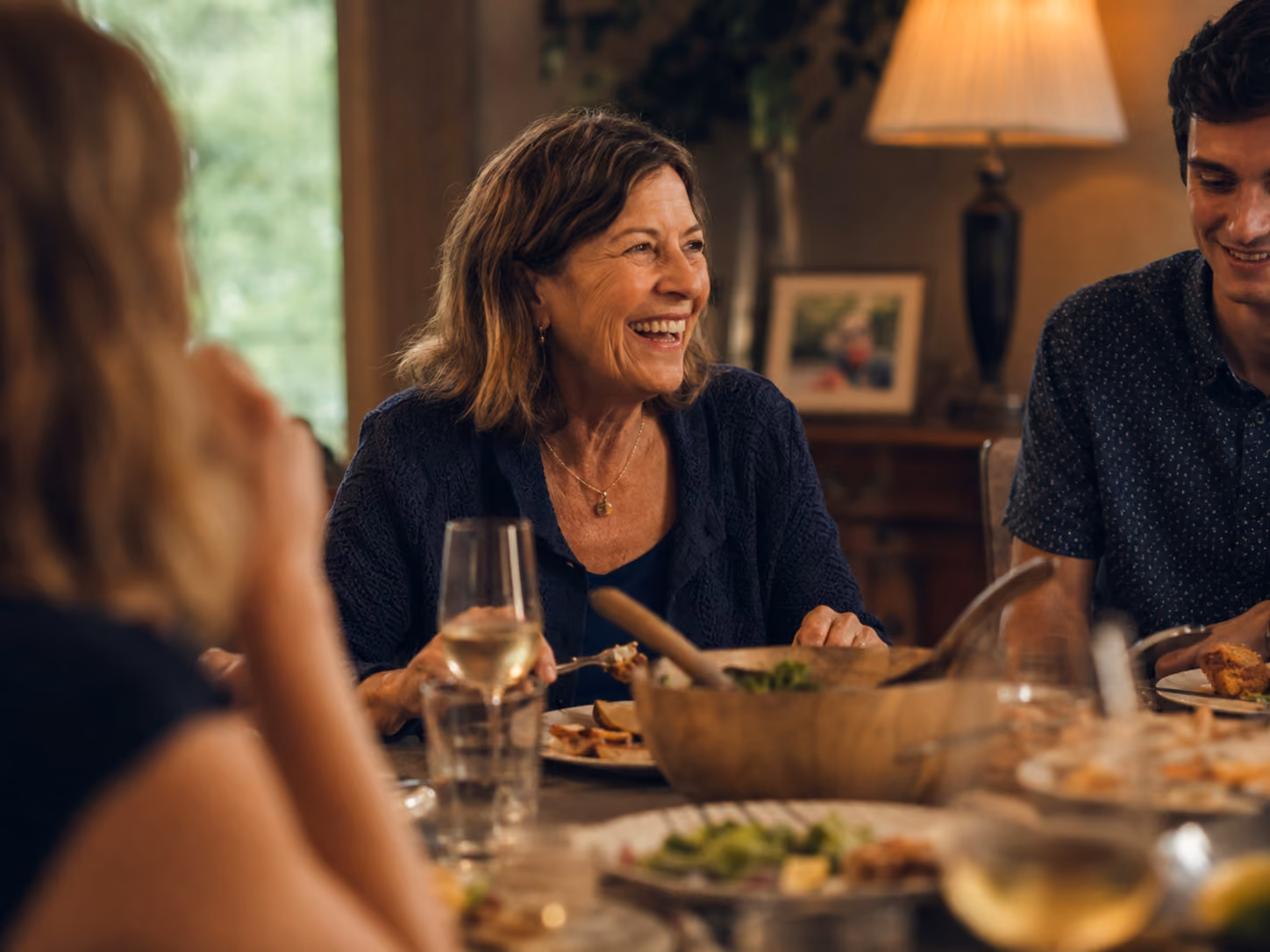 Family enjoying a meal together after dental treatment
