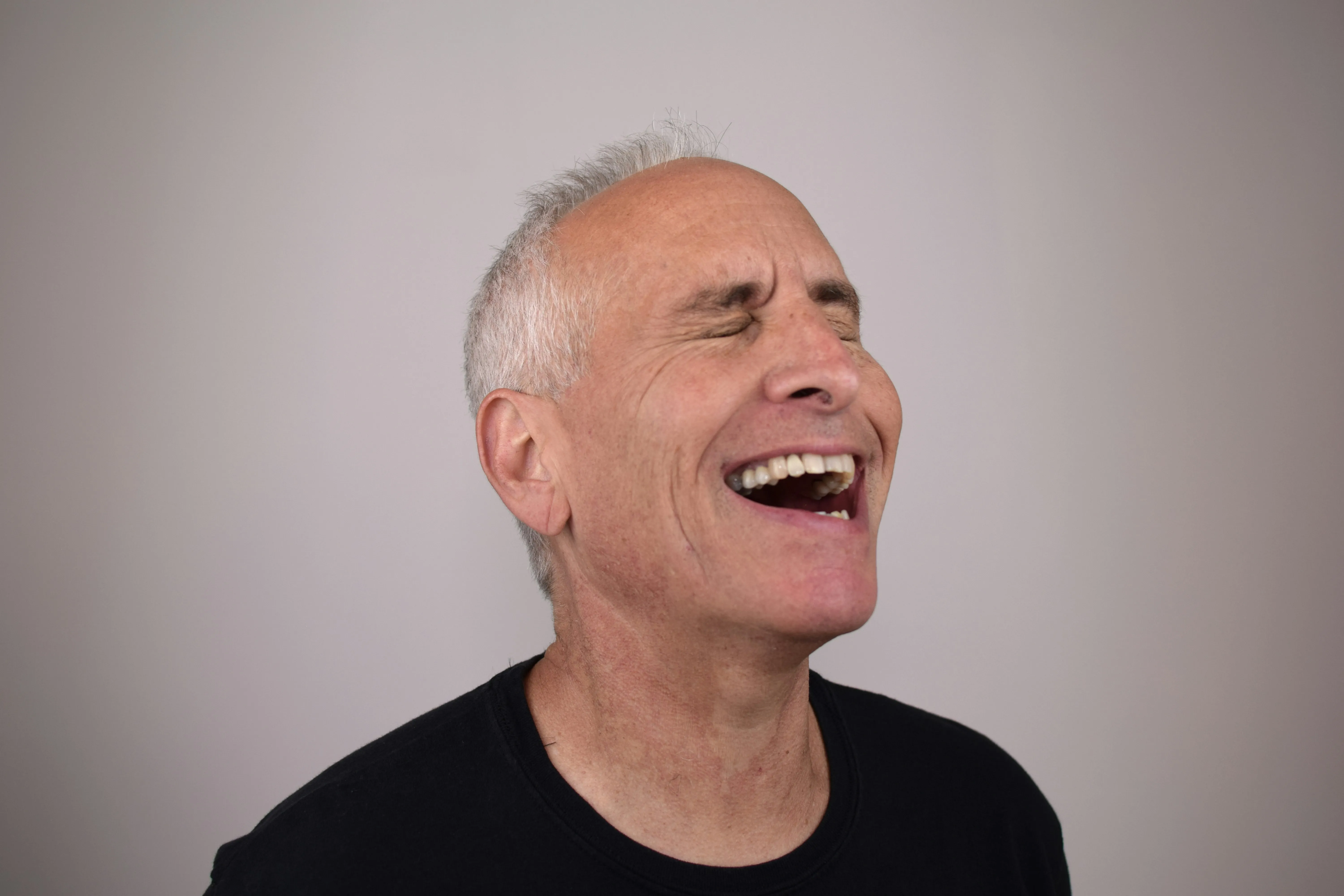 Patient smiling with a same-day fixed provisional dental bridge