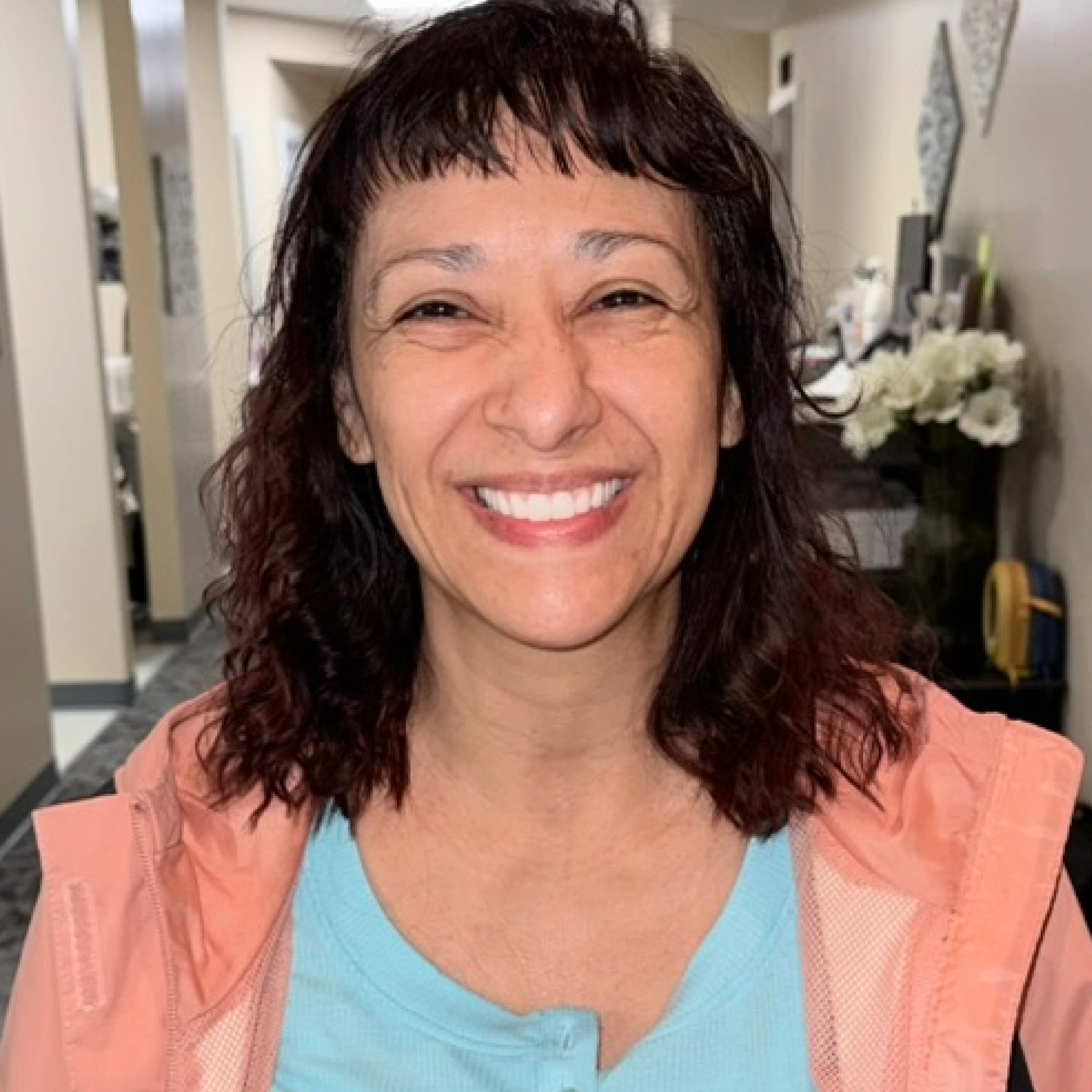 After: upper arch restored with an All-on-4 implant-supported zirconia bridge