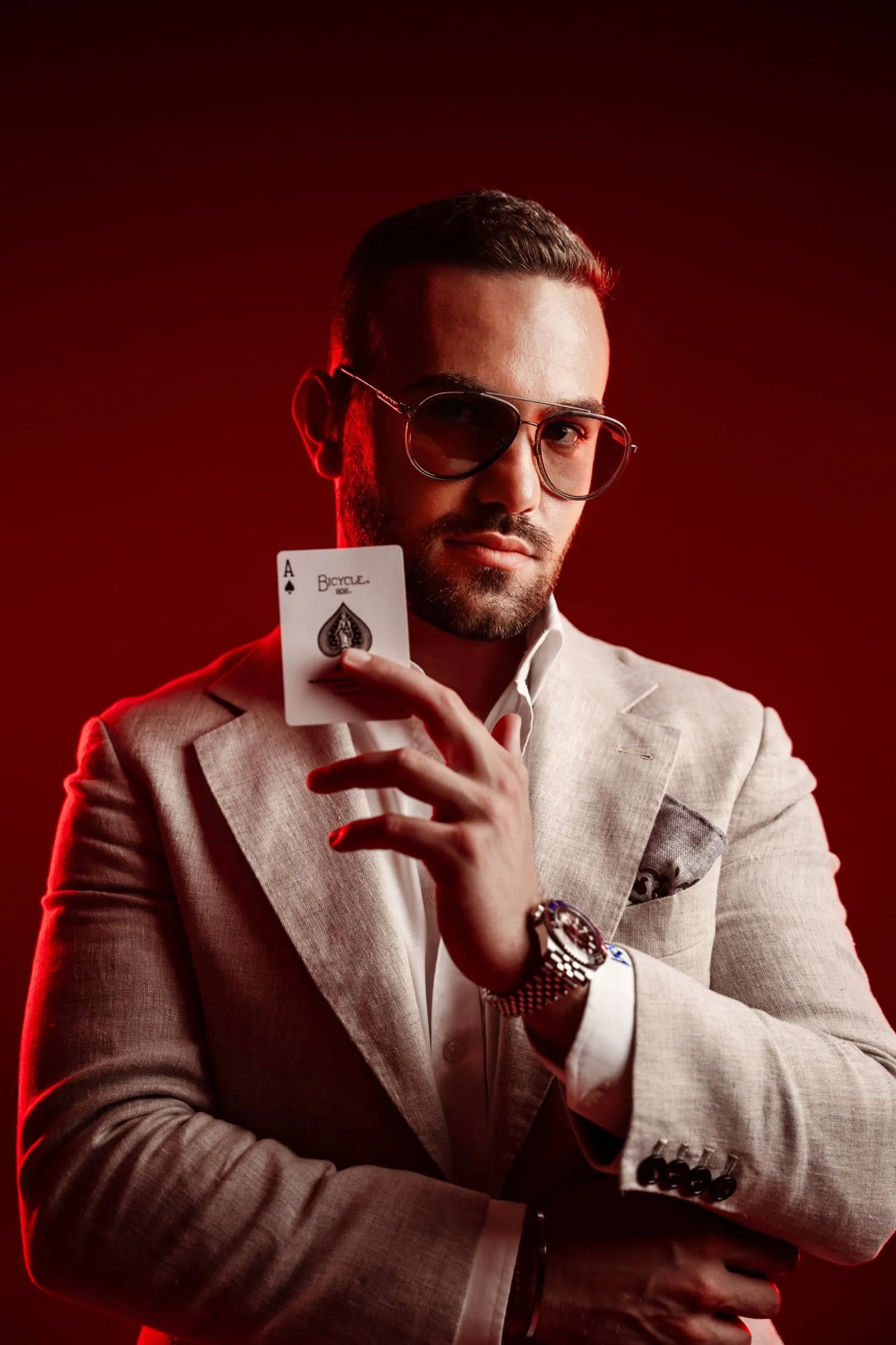 Matteo Cammisa, magician, holding an ace of spades