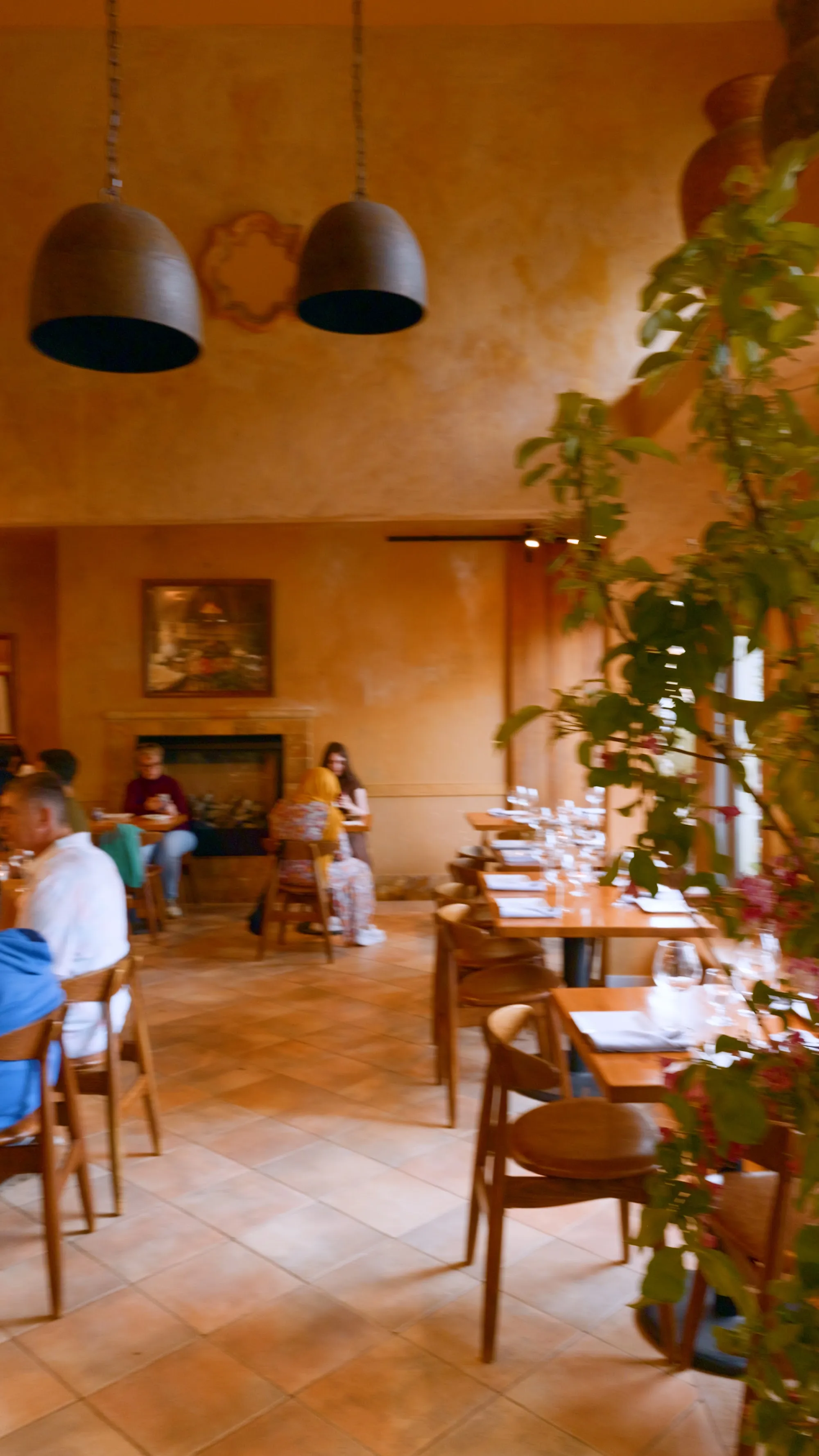 Lavash dining room in San Francisco, warm plaster walls and pendant lights