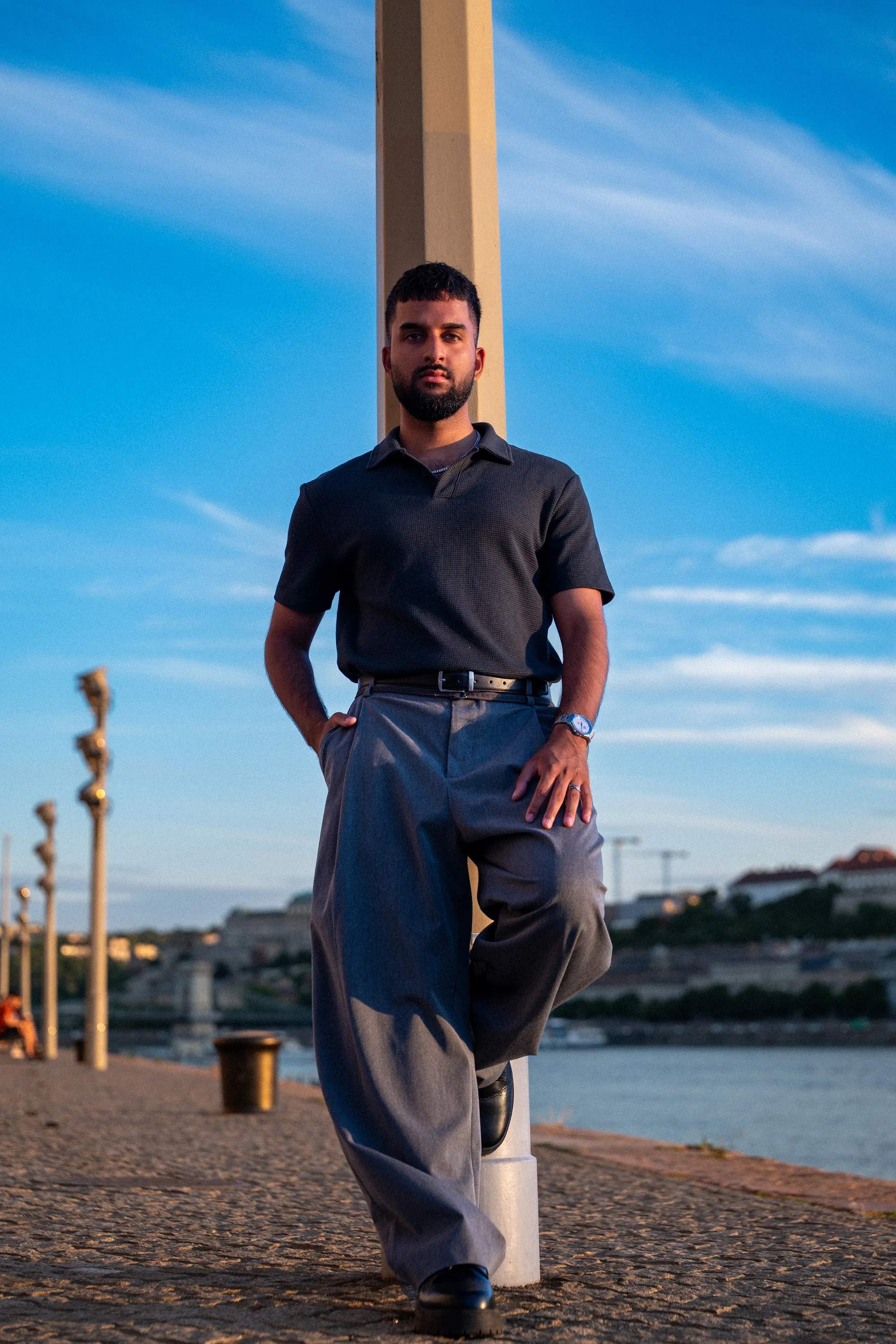 Model Zoubi on the Danube embankment in Budapest at golden hour, Parliament Gold editorial by GROOVE Media