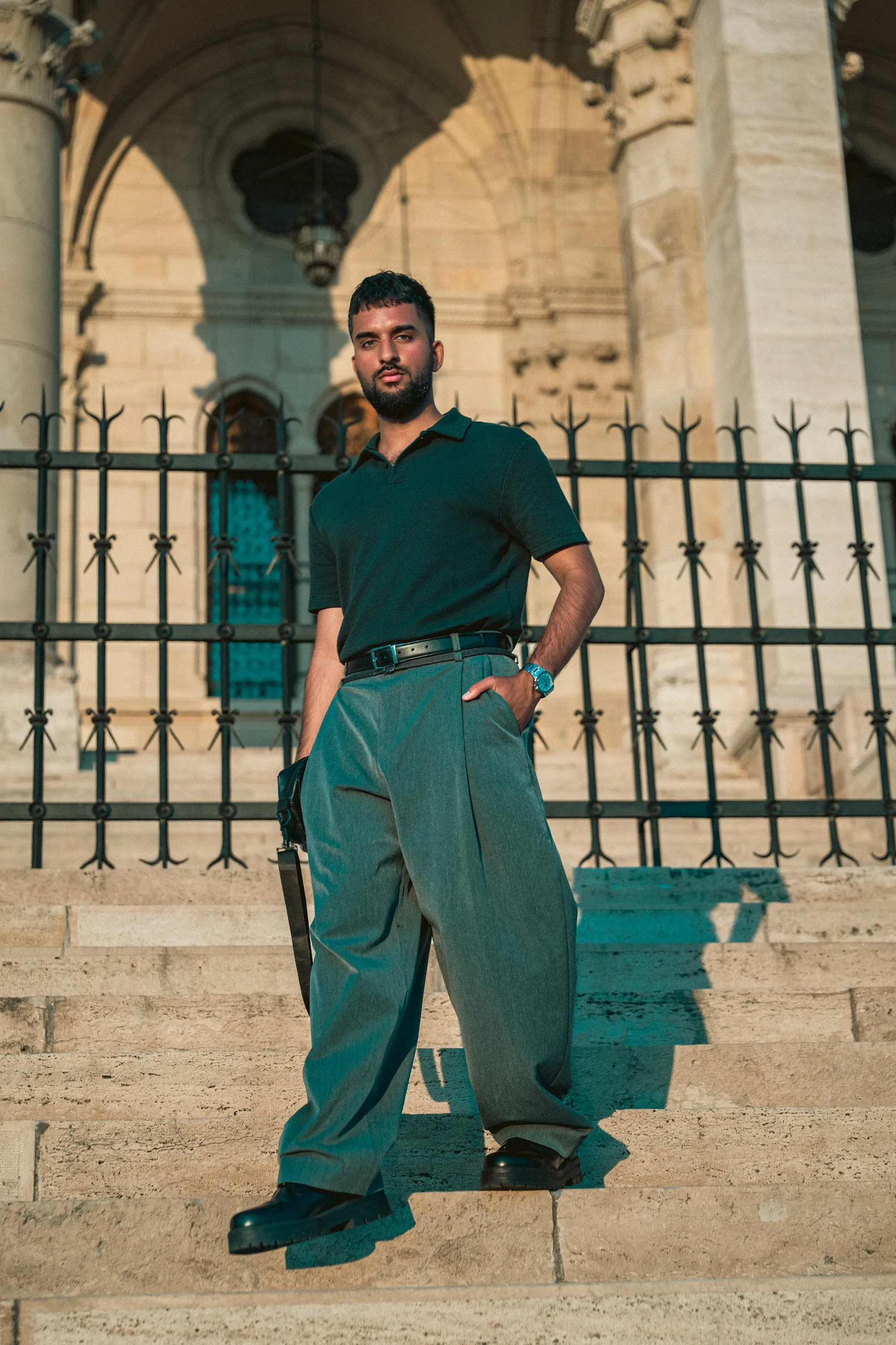 Model Zoubi framed by a stone arch at the Hungarian Parliament Building, Parliament Gold editorial by GROOVE Media