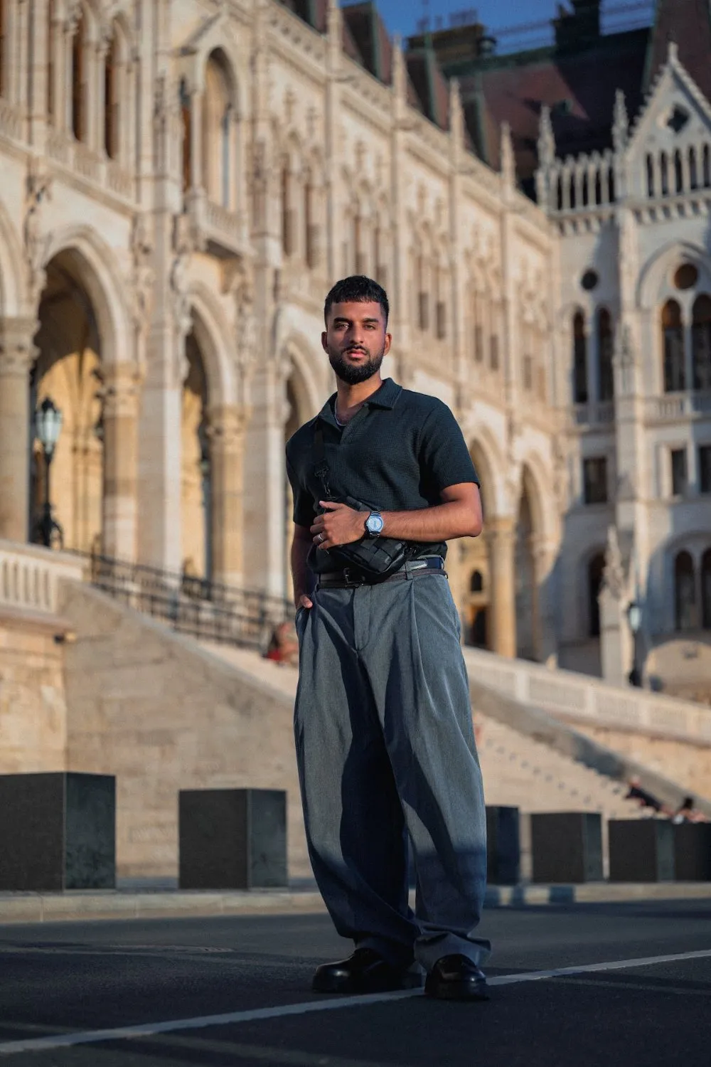 Model Zoubi standing before the arcades of the Hungarian Parliament, Parliament Gold editorial