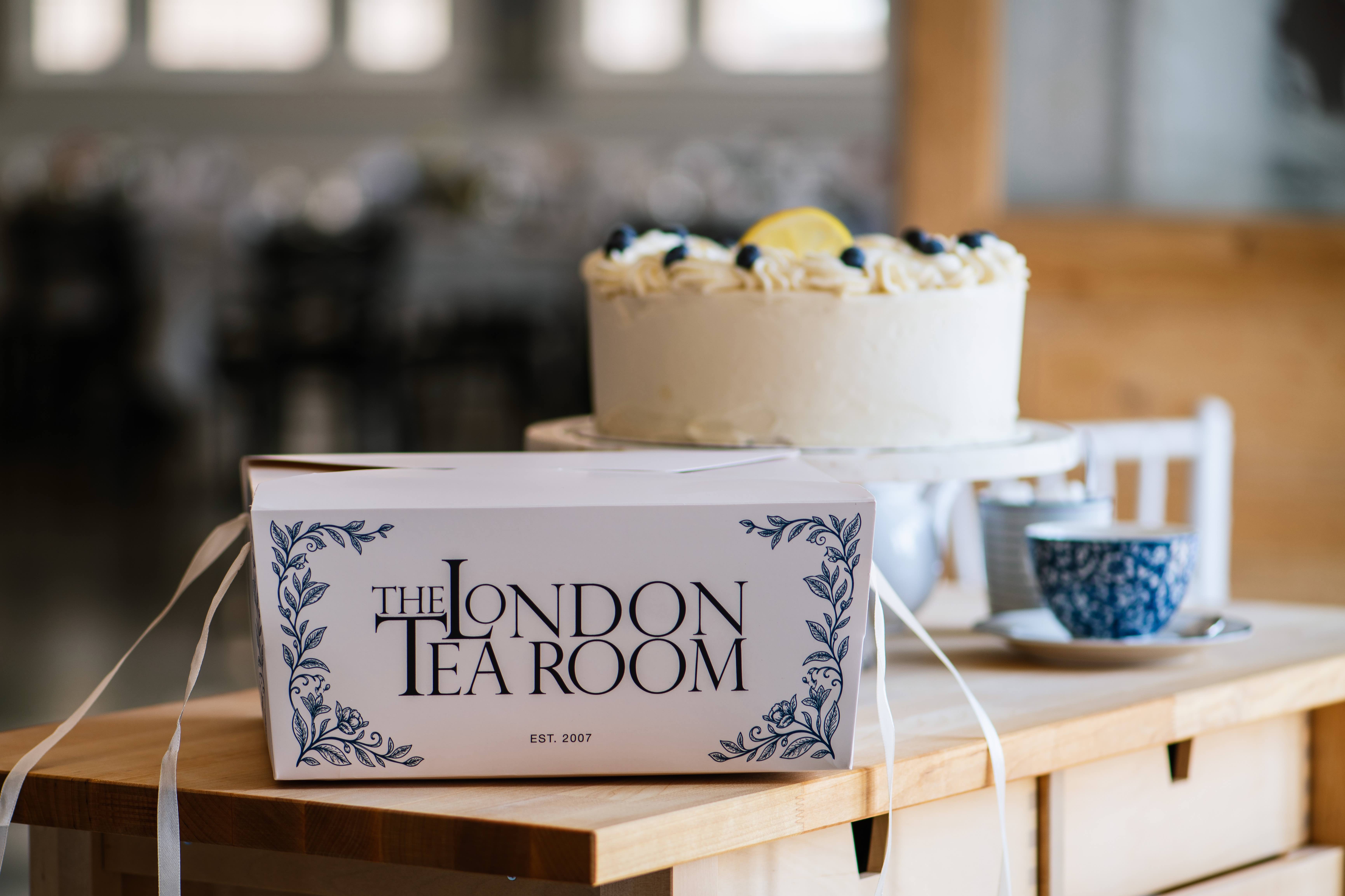 A boxed London Tea Room cake ready for pickup in St. Louis