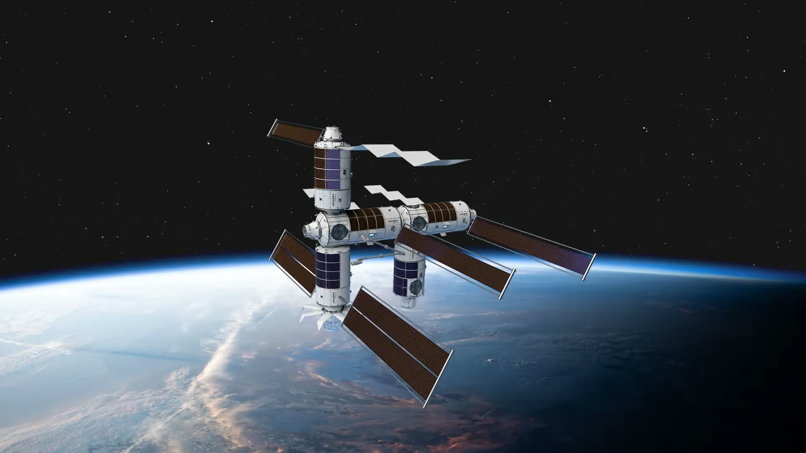 Space station with solar panels orbiting Earth against a starry black sky.