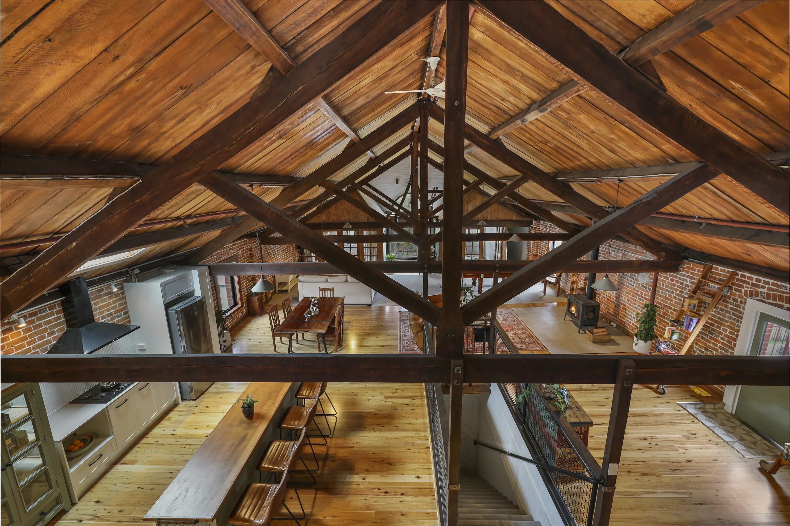 Soaring timber-truss ceiling of the Wool Store penthouse, Bathurst