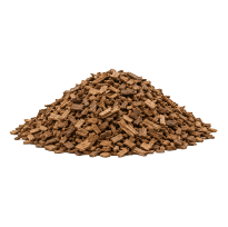 Pile of small brown wood chips on a white background.