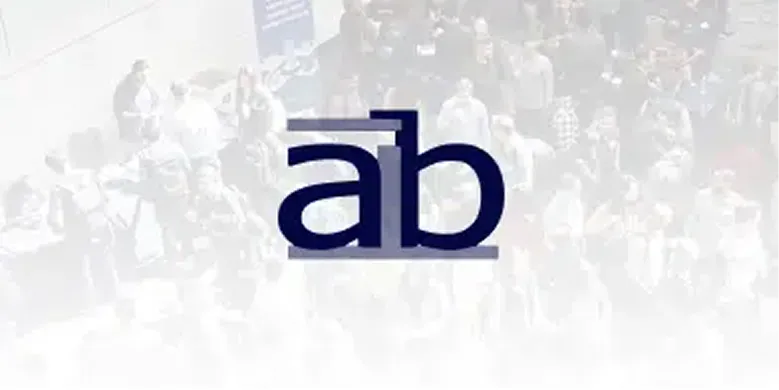 AIB logo over a faded photo of an event crowd