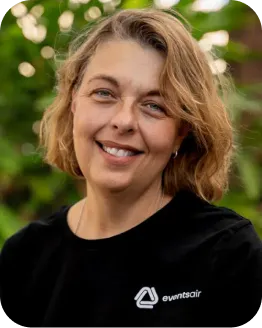 Portrait of Justine Stewart wearing an EventsAir branded shirt