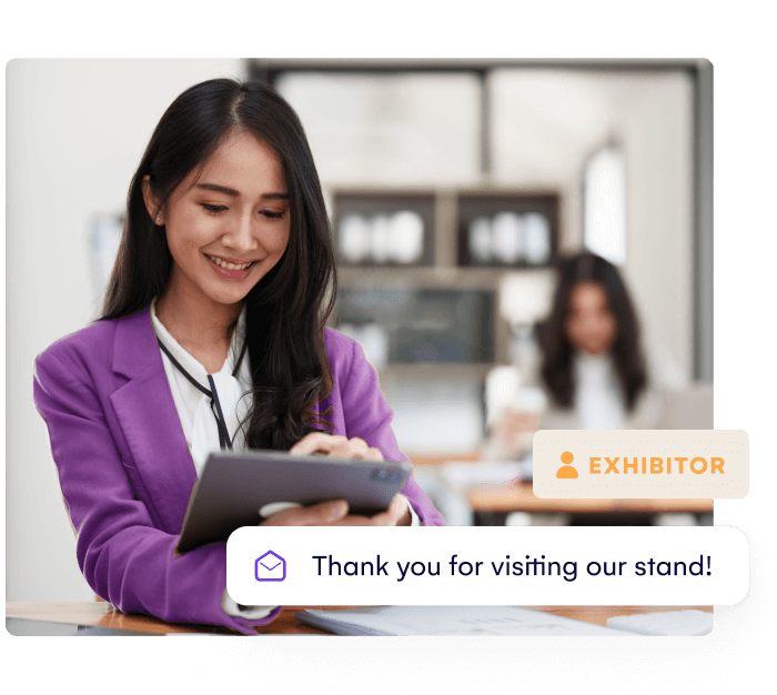 Exhibitor capturing leads on a tablet with a thank you for visiting our stand message