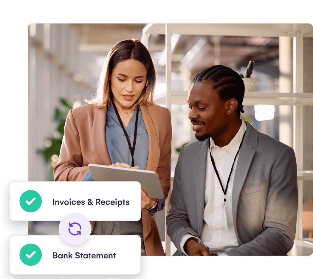 Event staff with a tablet beside invoices and bank statement reconciliation checkmarks