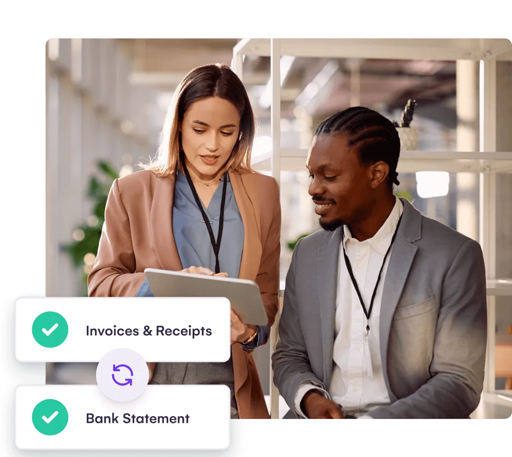 Event staff with a tablet beside invoices and bank statement reconciliation checkmarks