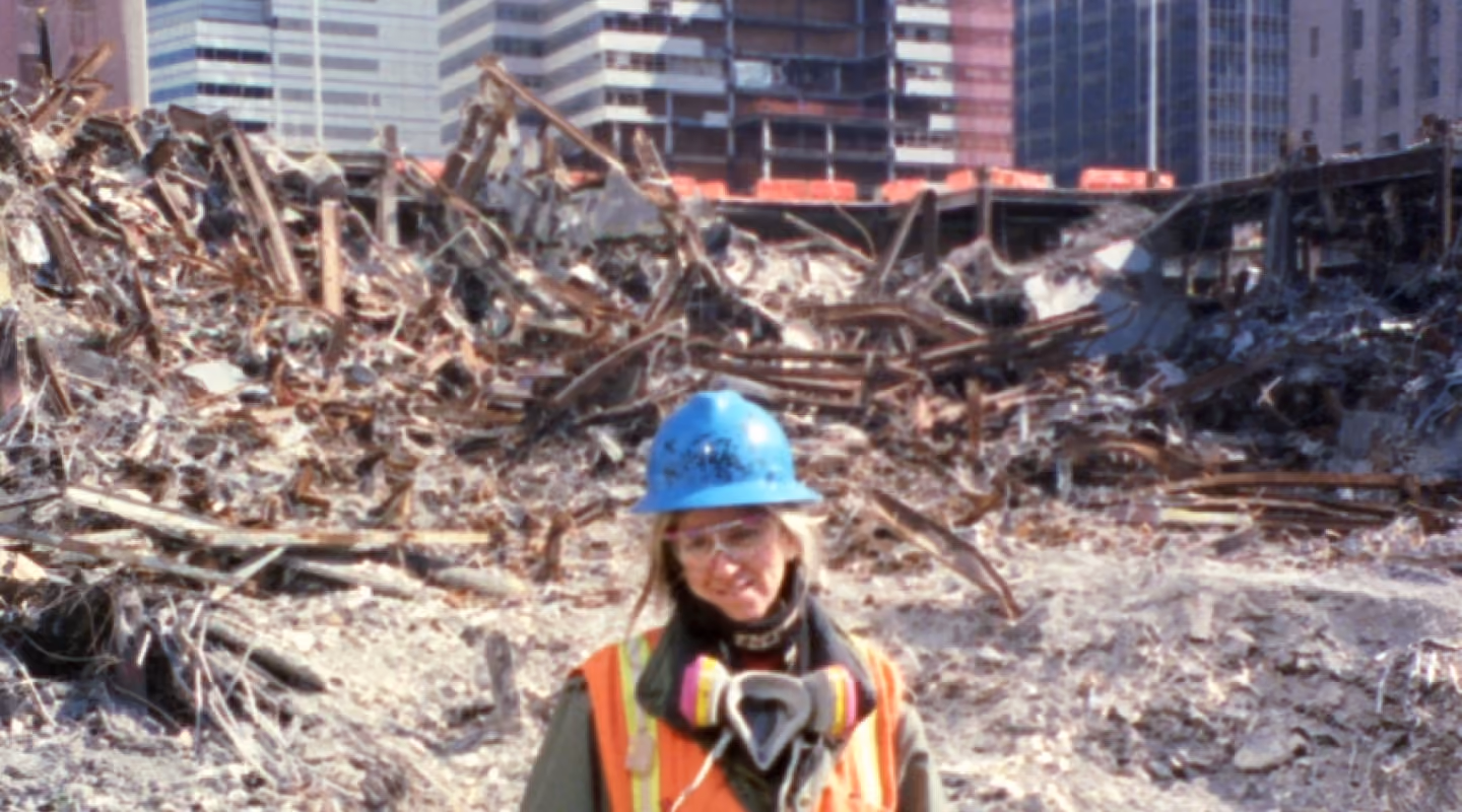 Solange Schwalbe wearing protective equipment while working at Ground Zero after 9/11.