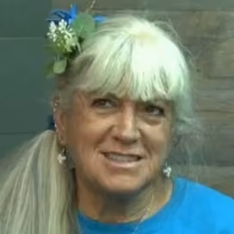 Solange Schwalbe holding credentials 