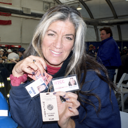 Solange Schwalbe holding credentials 