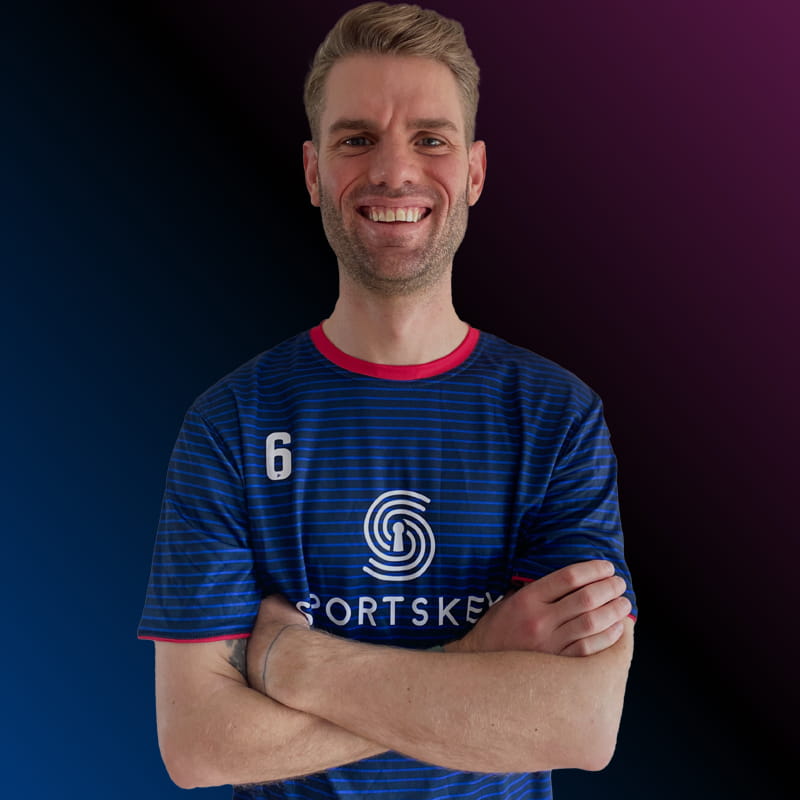 Dr. Tom McGuckian, Senior Sport Scientist, wearing a SportsKey jersey
