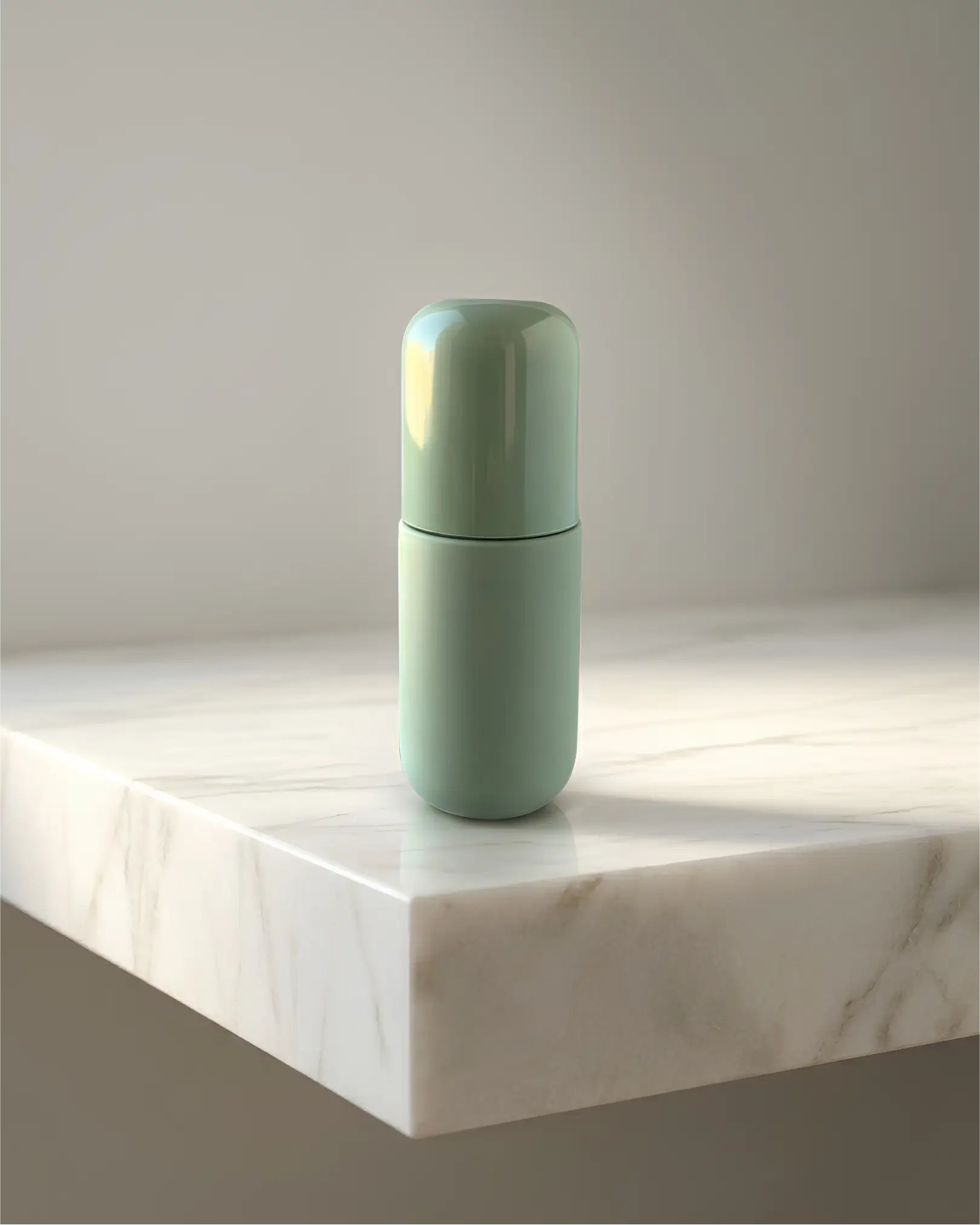 Minimalist matte terracotta cylindrical bottle placed on a concrete pedestal with diagonal shadows.