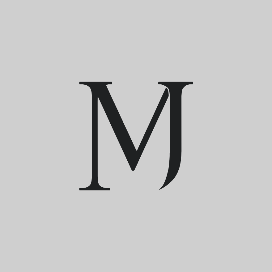 Black serif letter M on a plain gray background.