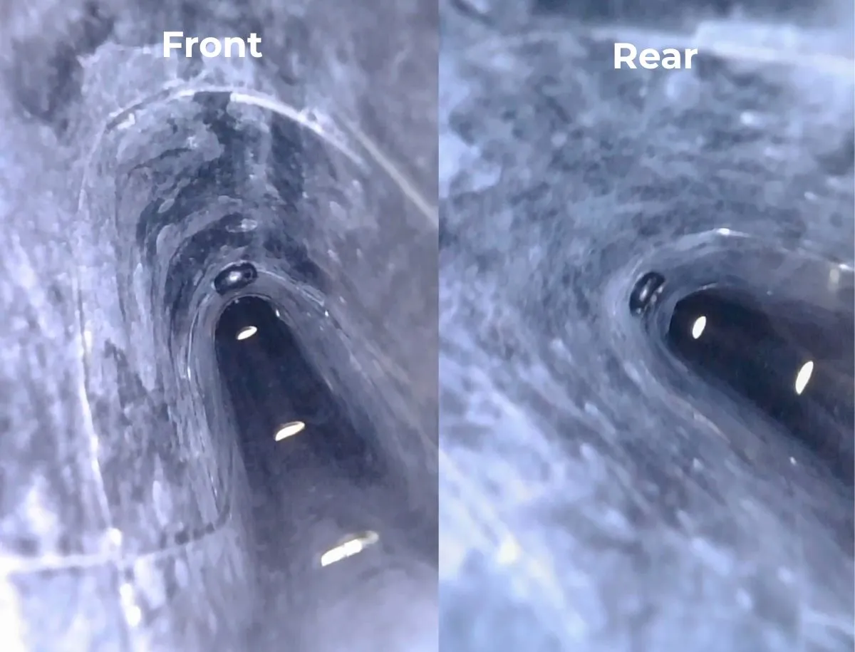 Endoscope camera view inside the front and rear rim spoke holes of the Superteam Classic Pro showing carbon fiber layup quality