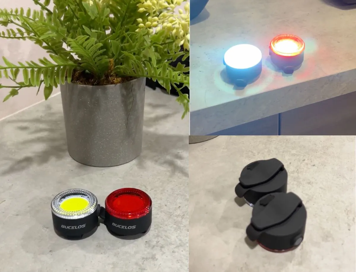 Bucklos USB-rechargeable front and rear bike lights shown off the bike in white and red beam colors, plus mounted in clip form on a countertop
