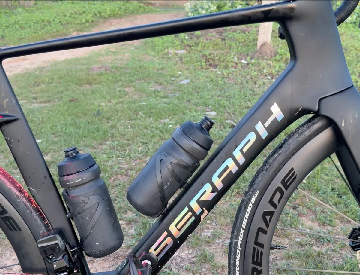 Close-up of the Seraph TT-X71 carbon frame with two included bottle cages and Serenade tyre