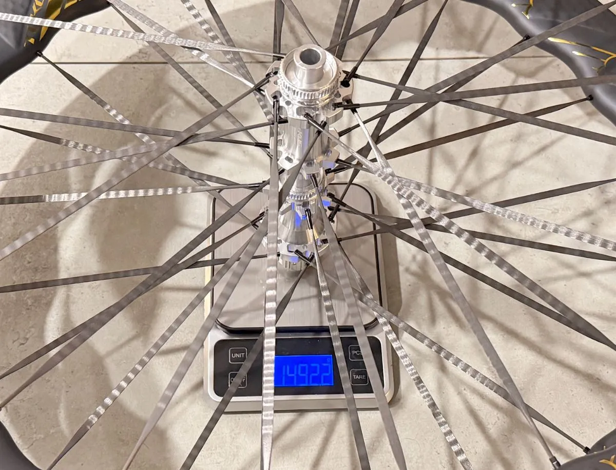 TUKUS Bluefin Turbo SR wheel on digital scale showing 1492.2 gram weight reading without rim tape or valves