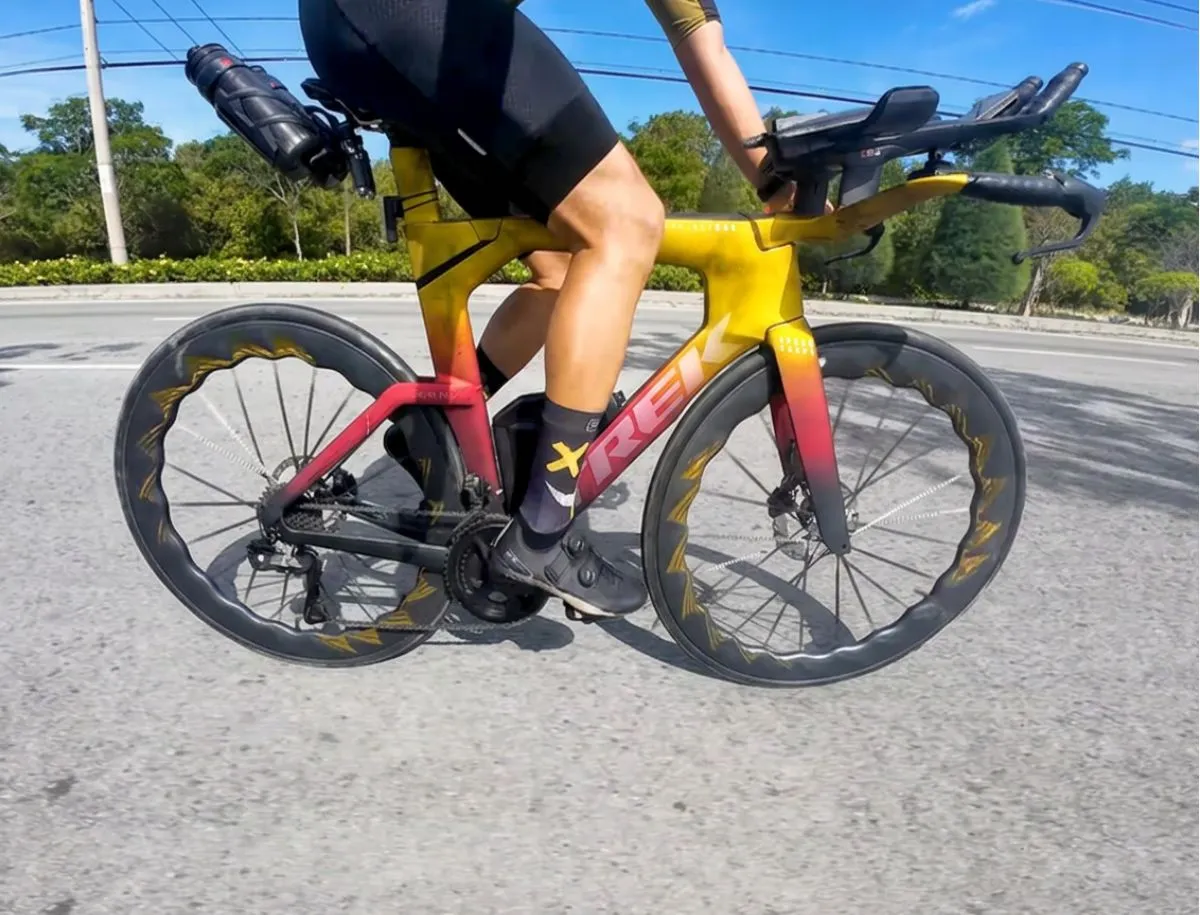 Mike Dee riding TUKUS Bluefin Turbo SR wheels on Trek triathlon bike during road test
