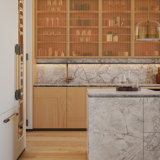 Cucina moderna con mobili in legno chiaro e isola con piano in marmo grigio.