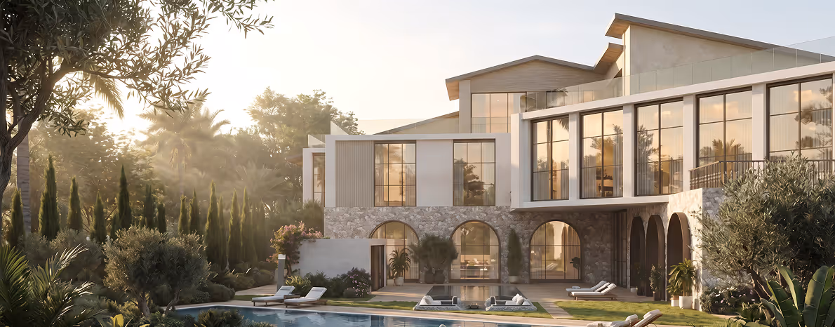 Mediterranean-style villa exterior with stone arches and olive trees by Emkaan