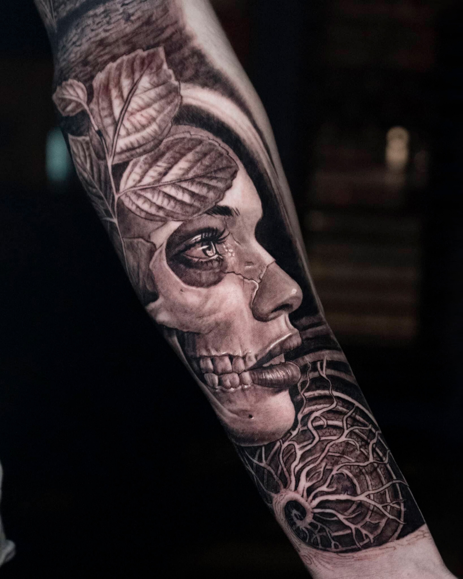 Surrealistic female portrait in Black and grey realism by Raza Tattoo in Aarhus 